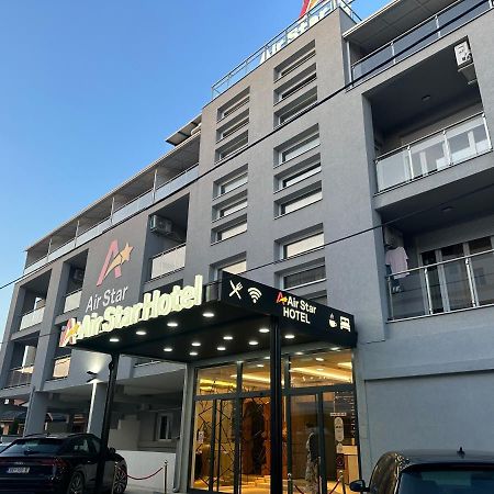 Airstar Hotel Surcin Bagian luar foto