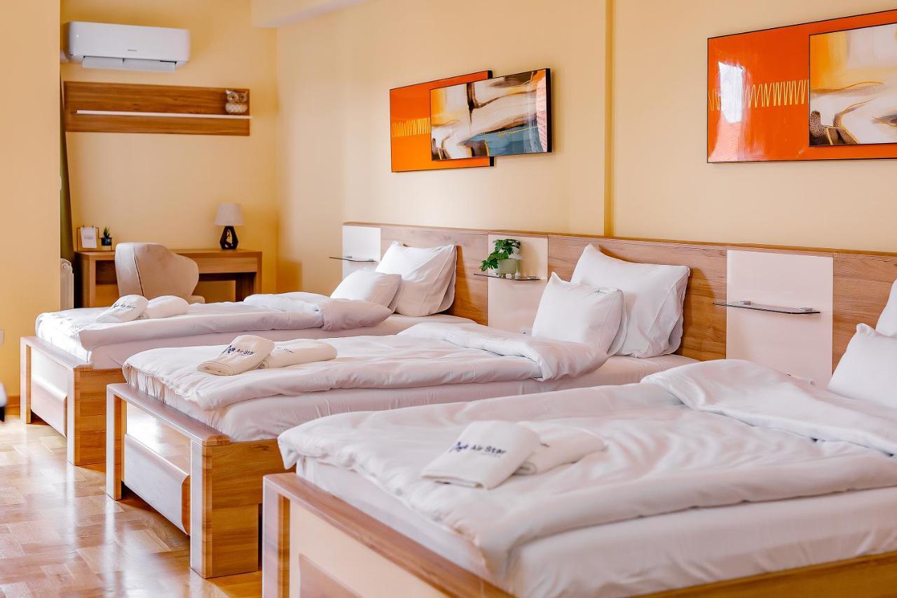 Airstar Hotel Surcin Bagian luar foto