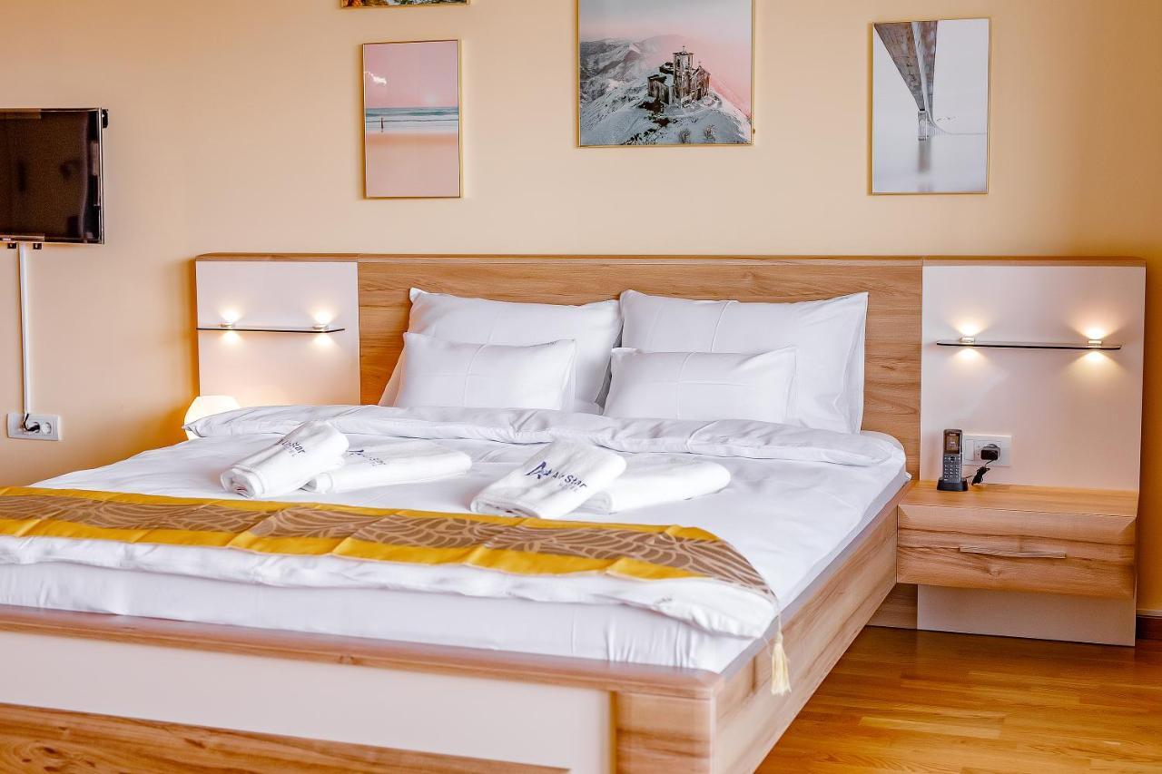 Airstar Hotel Surcin Bagian luar foto