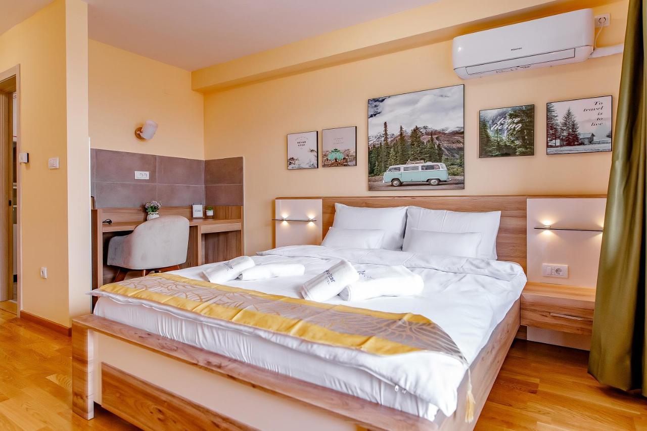 Airstar Hotel Surcin Bagian luar foto