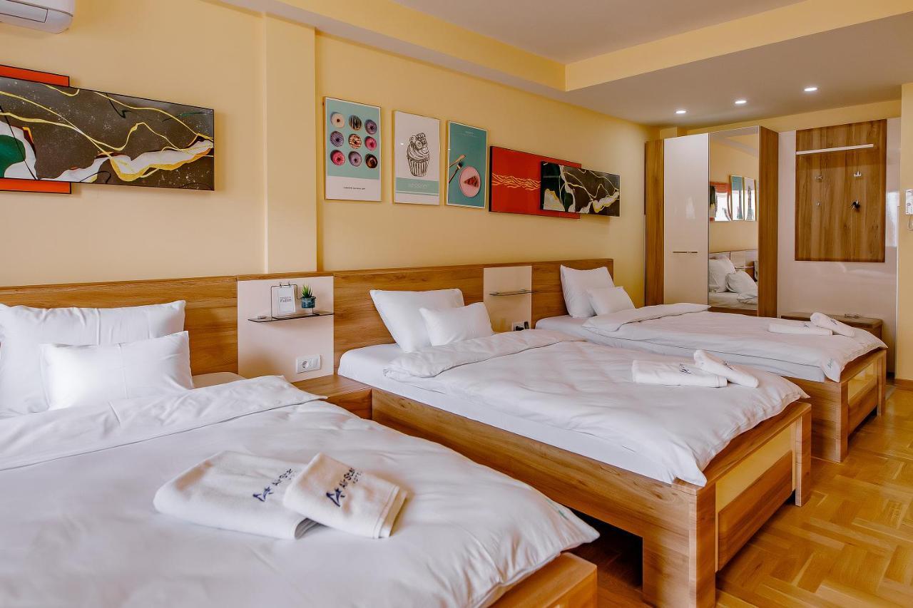 Airstar Hotel Surcin Bagian luar foto